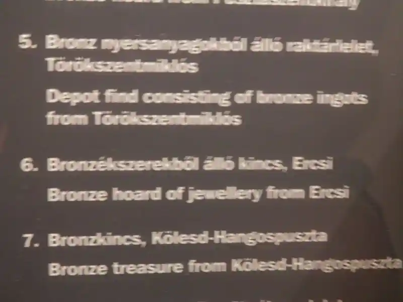 Bronze solar disc with cross in the center